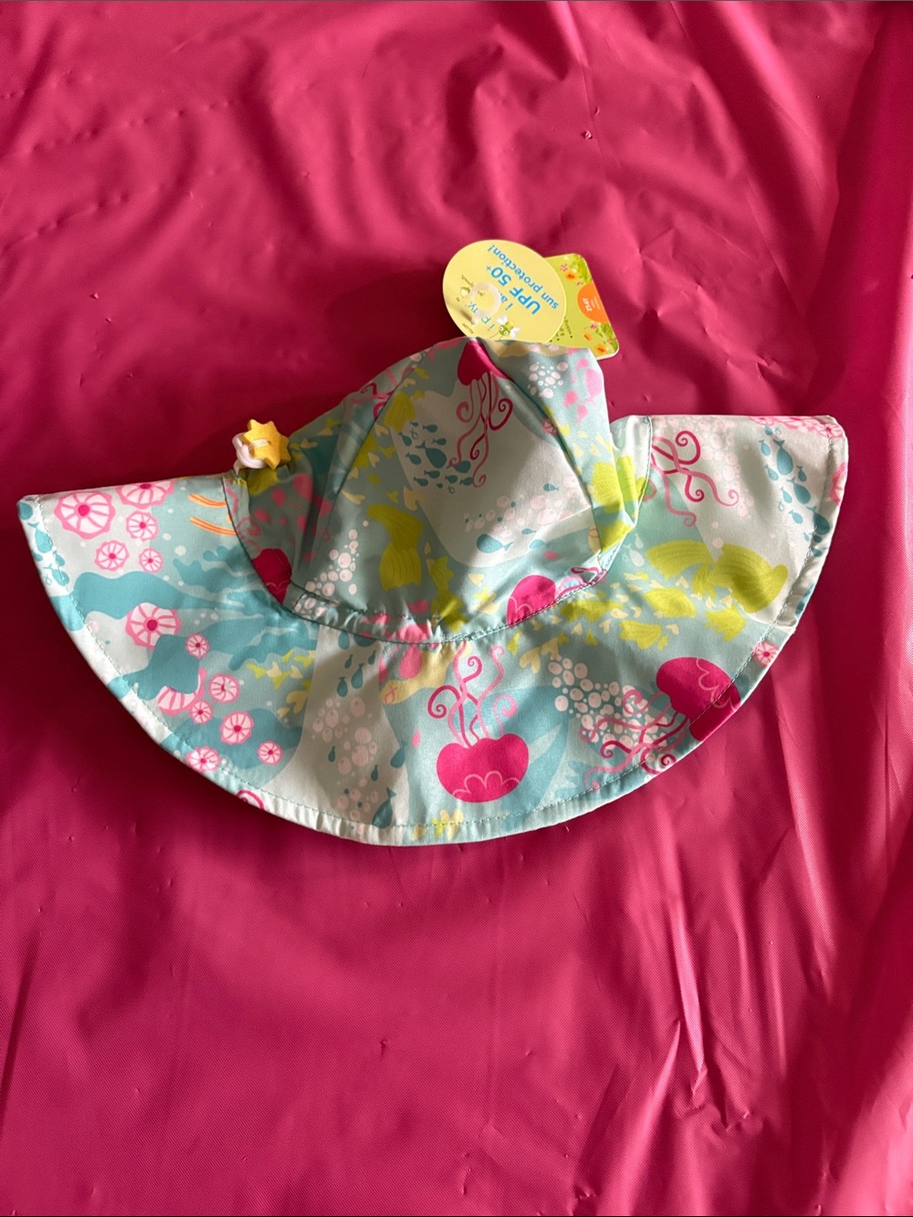 i play. Turquoise Pink Yellow Sea Life Sun Hat